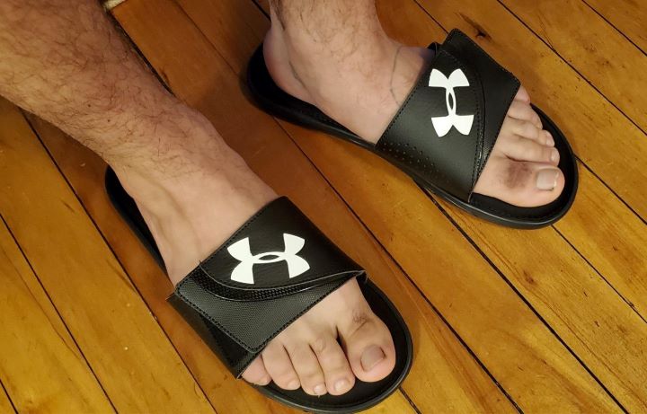 Having the adjustable orthopedic slide sandals from Under Amour