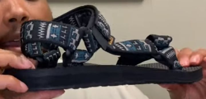 Checking the thickness and stability of the Teva sandals for flat feet