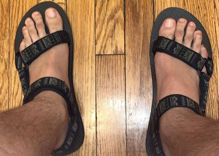 Wearing out the Teva Original slipper in a black color
