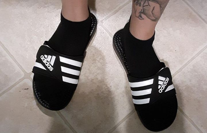 Having the excellent Adidas Adissage slide sandals in a black color