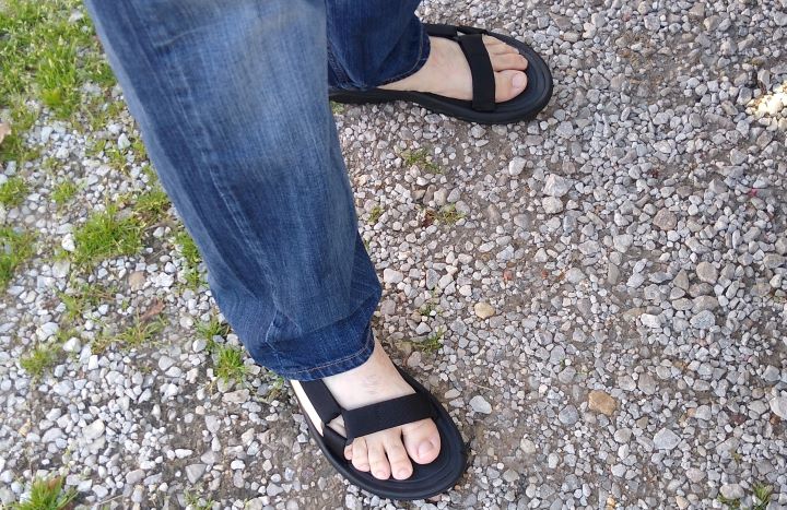 Testing the comfortability of the sandals for boating