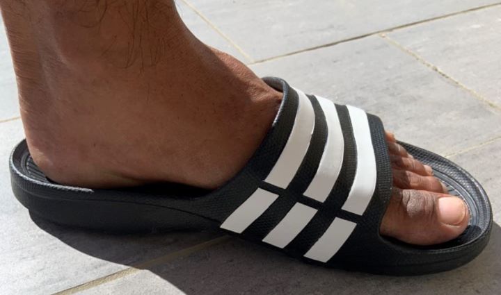 Inspecting how supportive the Adidas slides