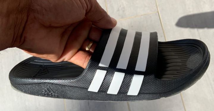 Checking the durability of the Adidas slides