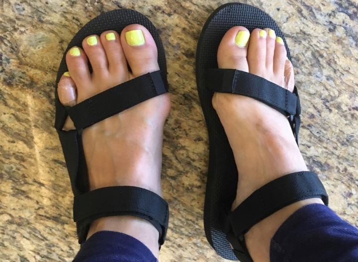 Wearing out the TEVA Universal sandal in a black color