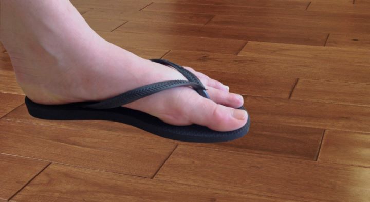 Showing Havaianas Slim Flip Flop Sandal in black color